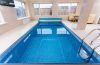 De voordelen van het investeren in een luxe zwembad